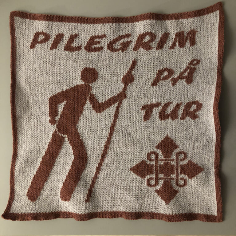 sitteunderlag pilegrim på tur